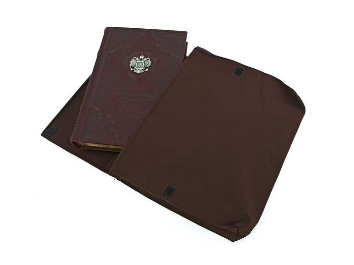 The leather-bound book "Notes on Russian history" by M. V. Lomonosov
