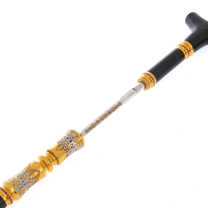 A cane made of stained oak with a stiletto "Aristocrat"