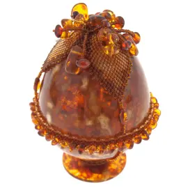 Яйцо пасхальное из янтаря с цветком-навершием