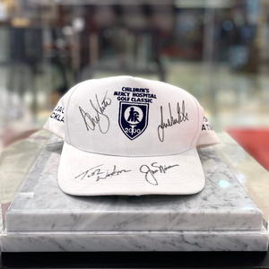 Cap with autographs of golfers Jack Nicklaus, Tom Watson, Nancy Lopez, Julie Inkster, white marble