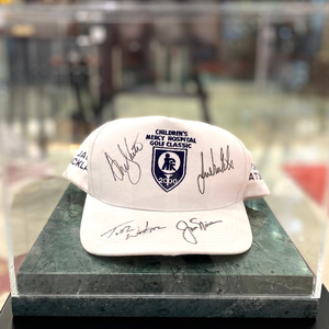Cap with autographs of golfers Jack Nicklaus, Tom Watson, Nancy Lopez, Julie Inkster, green marble