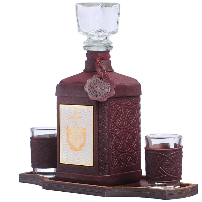 A decanter in a leather cover "FSB-3" with an overlay