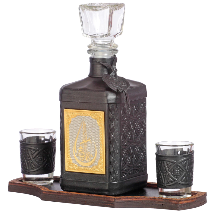 A decanter in a leather cover "Neftegaz-4" with a brass cover