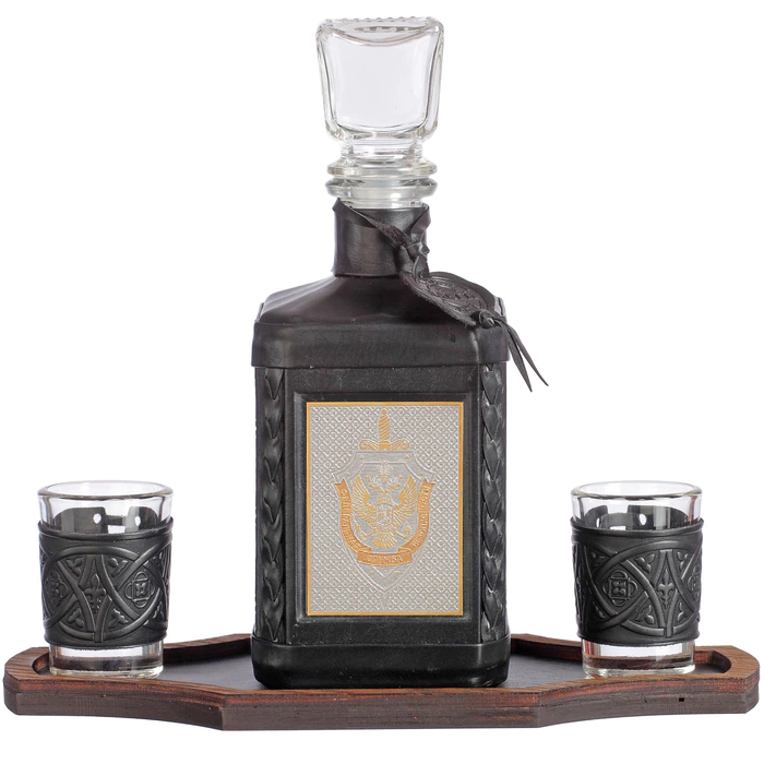 A decanter in a leather cover "FSB-4" with an overlay