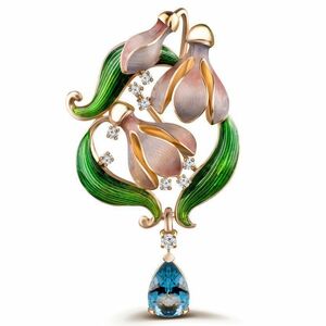 Yellow gold brooch with diamonds and topaz