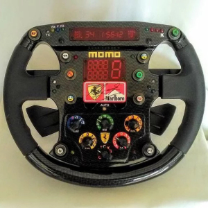 Replica steering wheel of a 1999 Ferrari F399 autographed by racer Michael Schumacher