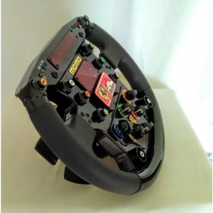 Replica steering wheel of a 1999 Ferrari F399 autographed by racer Michael Schumacher