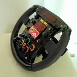 Реплика руля 1999 г. Ferrari F399 с автографом гонщика Михаэля Шумахера