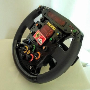 Replica steering wheel of a 1999 Ferrari F399 autographed by racer Michael Schumacher