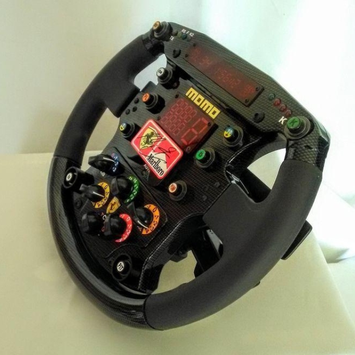 Replica steering wheel of a 1999 Ferrari F399 autographed by racer Michael Schumacher
