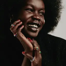 Кольцо из красного золота с изумрудом и бриллиантами Кольцо из красного золота с изумрудом и бриллиантами