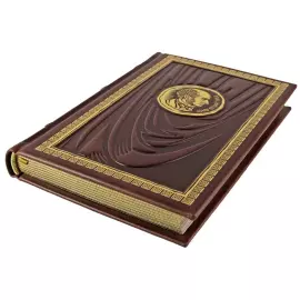A leather-bound book "About the subordination of a woman." John Stuart Mill