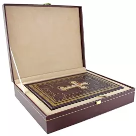 The leather-bound book "The Holy Gospel" in a gift box