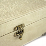 A gift box for jewelry on legs, with a lock