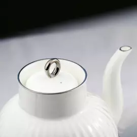 Серебряный чайный  набор "Симфония": вилка для лимона, сахарница, сливочник, совок для сахара, чайник