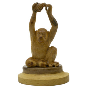 Mammoth tusk sculpture "Monkey with a grenade"