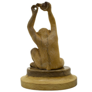 Mammoth tusk sculpture "Monkey with a grenade"