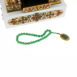 Lamp-mosque "Chor Minor" with the Koran and rosary beads, Zlatoust