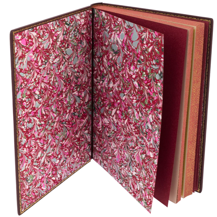 The leather-bound book "The Art of Love" by Ovid