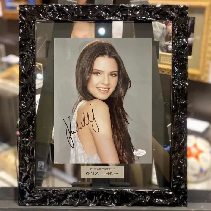 An autographed photo of model Kendall Jenner