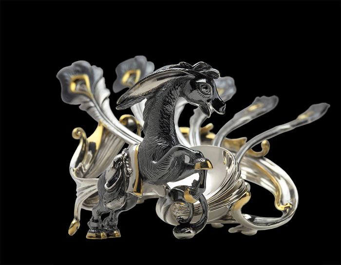 Set of 6 silver teaspoons with a "Humpbacked Horse" stand