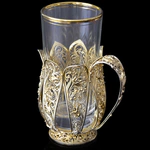 Inspiration cup holder made of silver with gilding