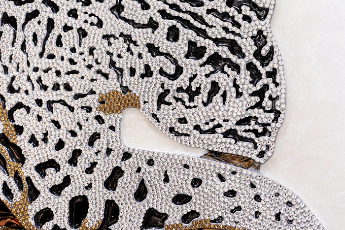 The author's jewelry panel "Leopard in rhinestones"