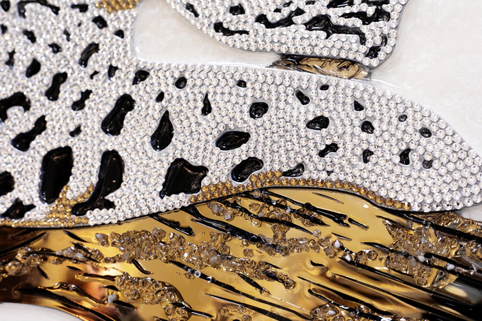 The author's jewelry panel "Leopard in rhinestones"