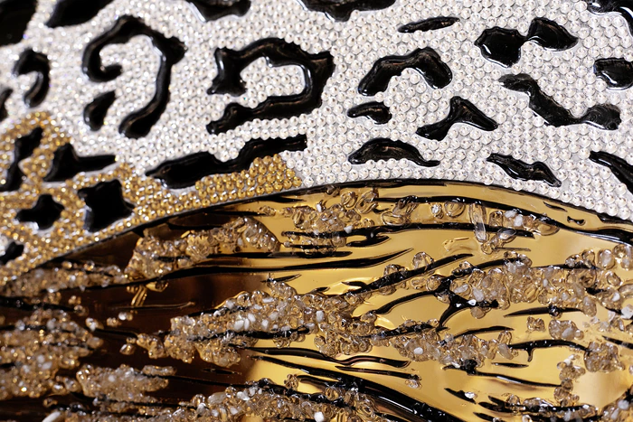 The author's jewelry panel "Leopard in rhinestones"