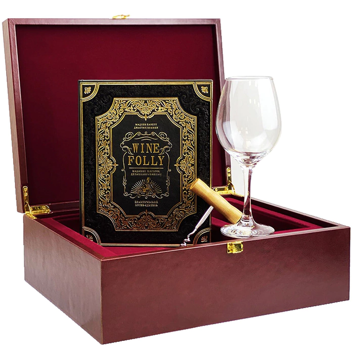 A gift set with a book, a glass and a corkscrew "Wine. Travel Guide"