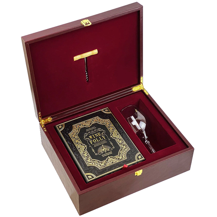 A gift set with a book, a glass and a corkscrew "Wine. Travel Guide"