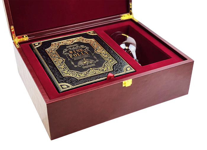 A gift set with a book, a glass and a corkscrew "Wine. Travel Guide"