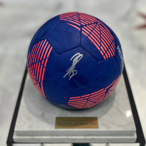 The ball with the autograph of footballer Karim Benzema, white marble