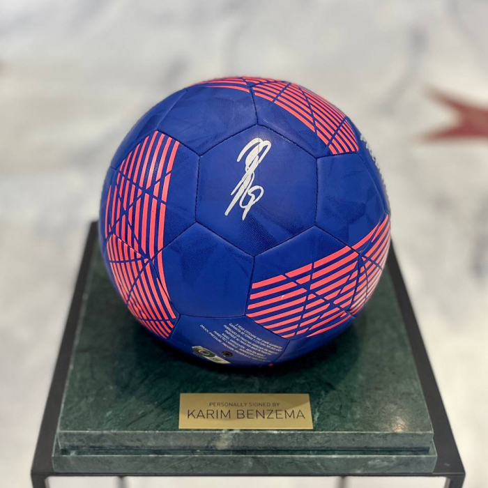 The ball with the autograph of football player Karim Benzema, green marble
