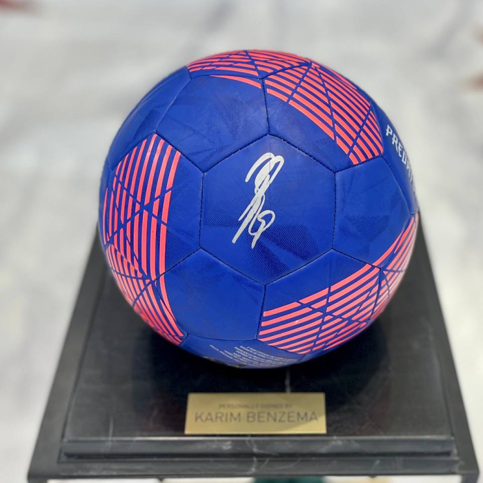The ball with the autograph of football player Karim Benzema, black marble