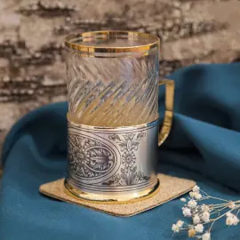 Подстаканник из серебра "Цветы" Подстаканник из серебра "Цветы"