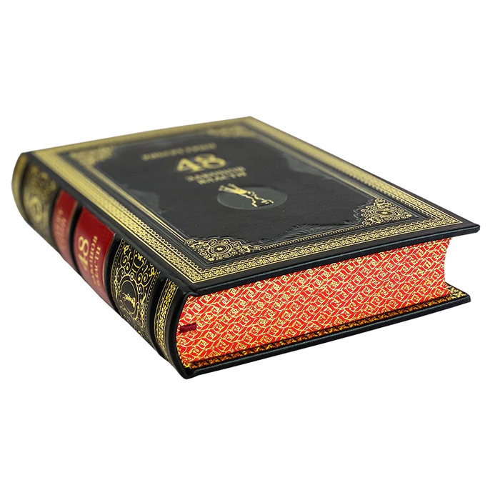 The leather-bound book by Robert Green "48 laws of power."