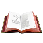 The leather-bound book by Robert Green "48 laws of power."