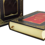 The leather-bound book "The Book of Power. The Great Canons of China."