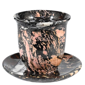 A cup and saucer made of jasper