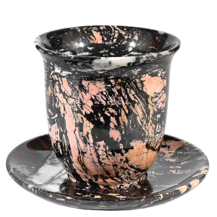A cup and saucer made of jasper
