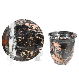 A cup and saucer made of jasper
