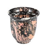A cup and saucer made of jasper