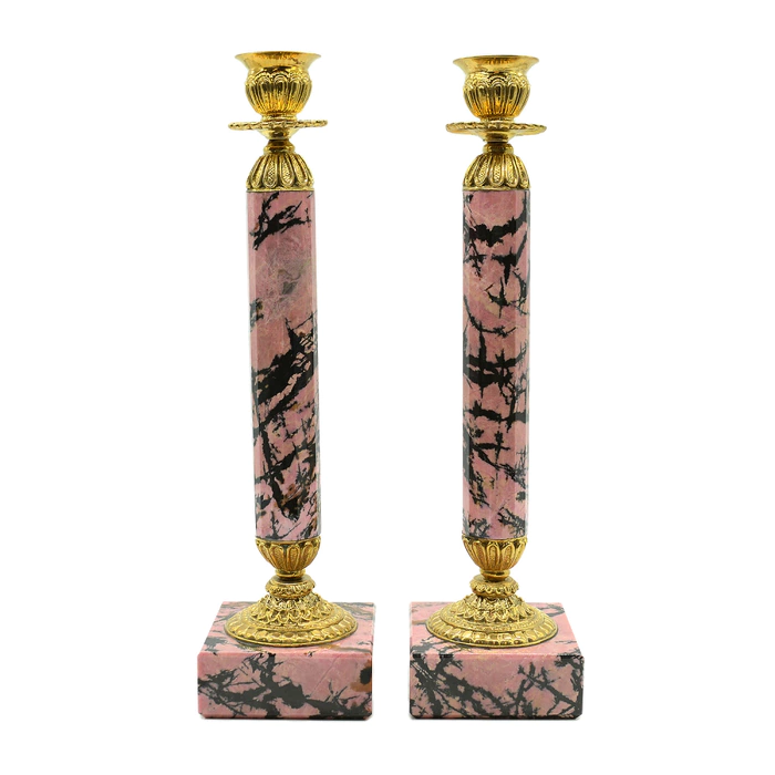 A pair of rhodonite candlesticks