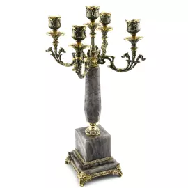 A candelabrum made of rauchtopaz with bronze