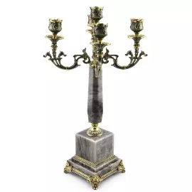 A candelabrum made of rauchtopaz with bronze