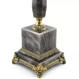 A candelabrum made of rauchtopaz with bronze