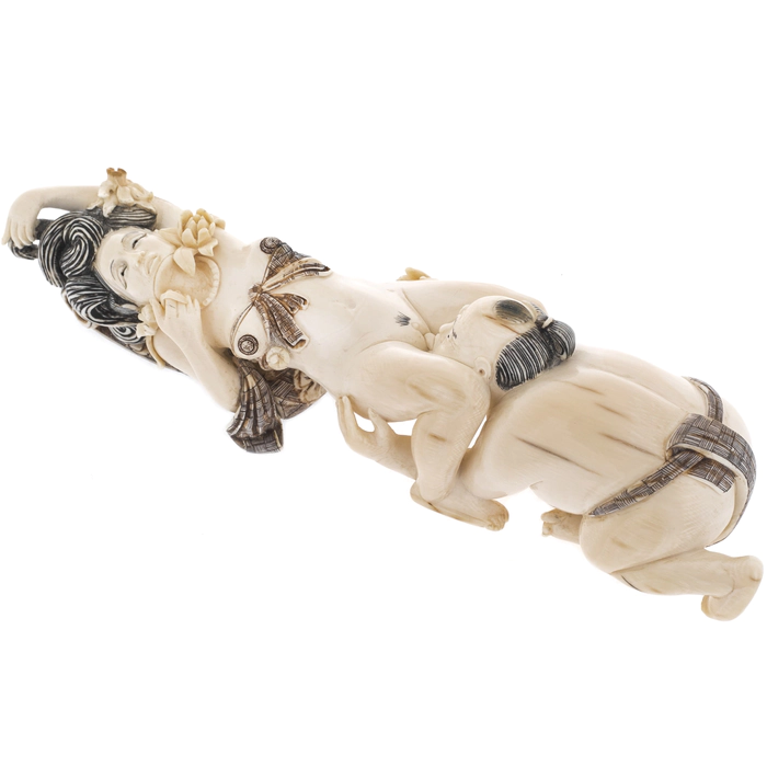 Souvenir from a mammoth tusk "Caresses to a woman from a man"