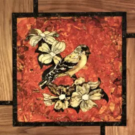 Панно из янтаря "Птица на ветке"