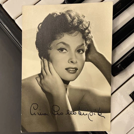 An autographed photo. Actress Gina Lollobrigida